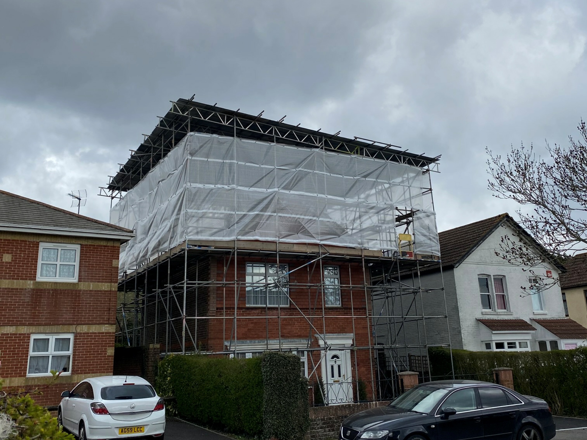 Scaffolding work Temporary roof scaffolding over a residential house